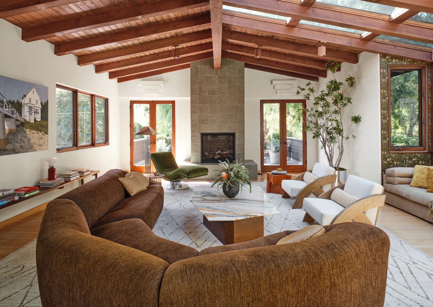 Living Room Centered on Brown Curved Sofa, Jagged Coffee Table